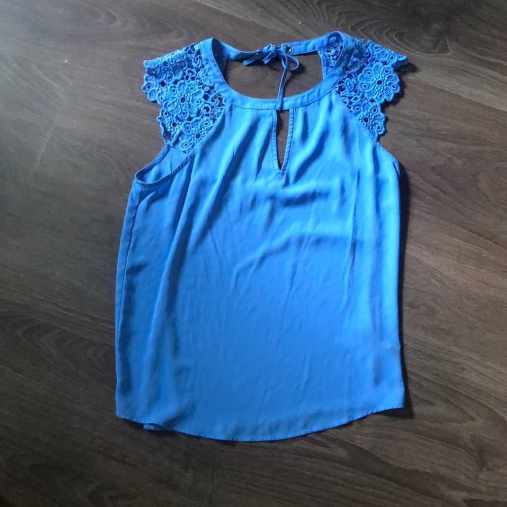 Blue blouse with back and shoulder details